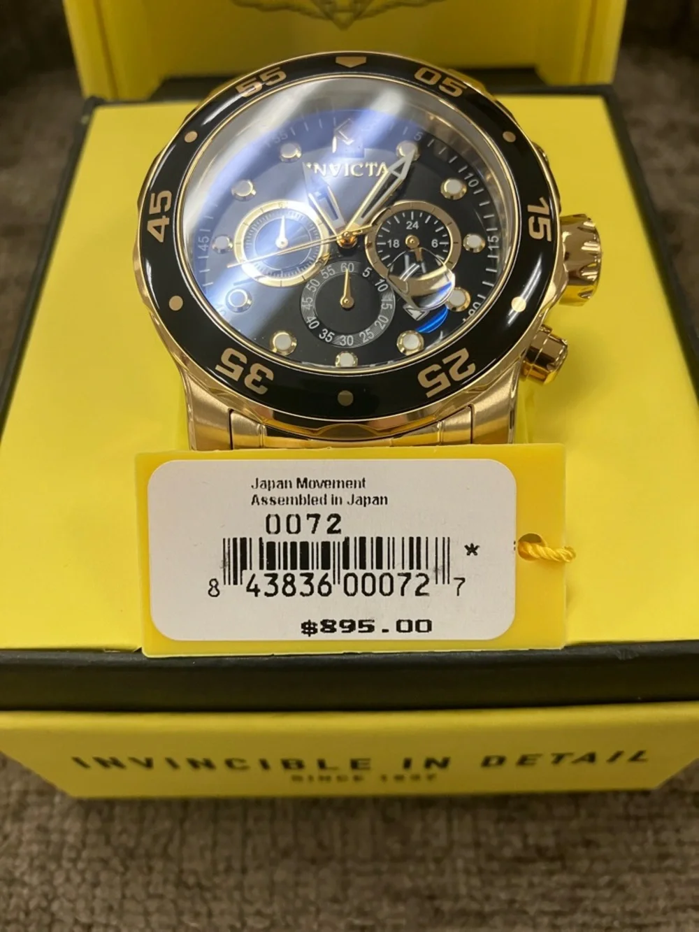 Invicta Gold and Black Stainless Steel Chronograph Watch